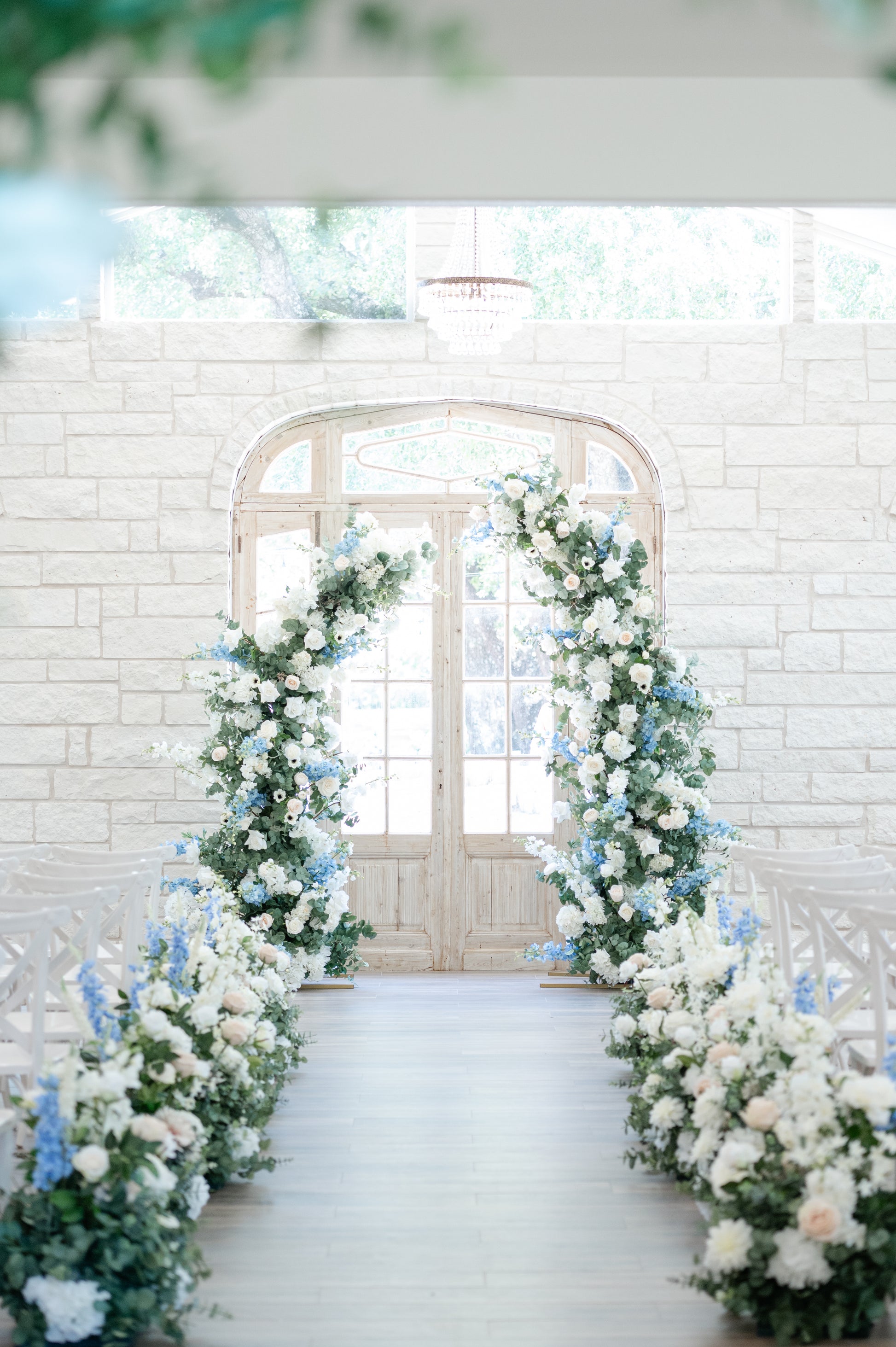 Faux flowers for weddings,floral rentals,Stress-free wedding floral set-up, Neutral color pallett, white,cream and blue flowers.