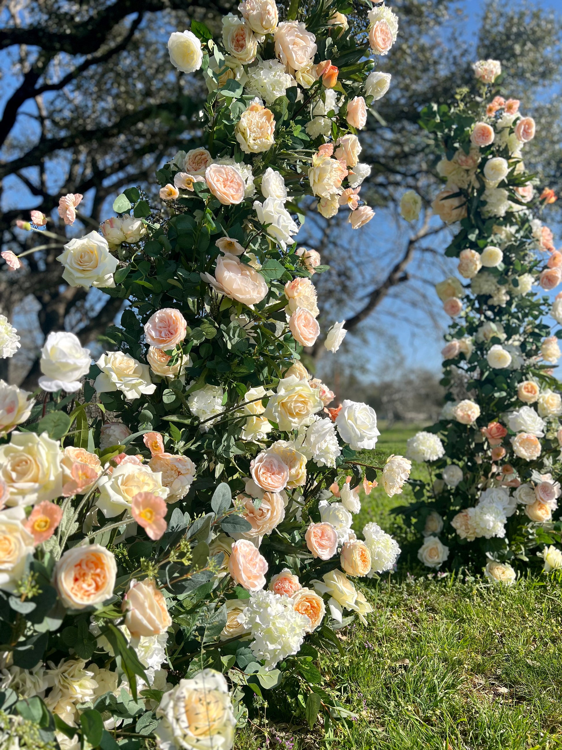 Lavish Blooms Sunset serenity arch, a peach toned garden style arch 